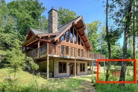 Chalet de luxe en bois rond au bord du lac - Le Beaver