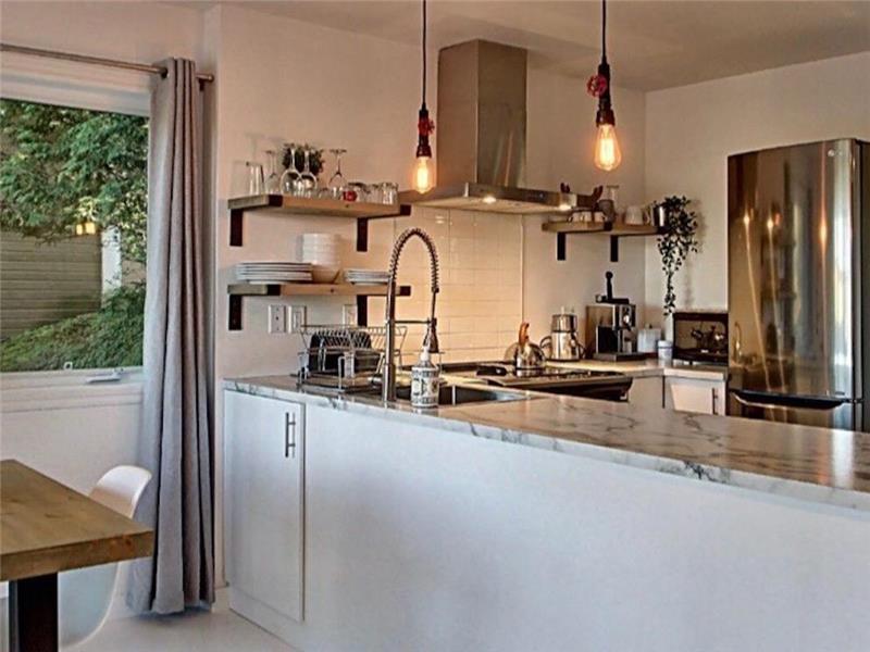 THE BEST LOCATION IN BROMONT ! At the bottom of the main lift !Ski in ski out / Bike in-out/pool