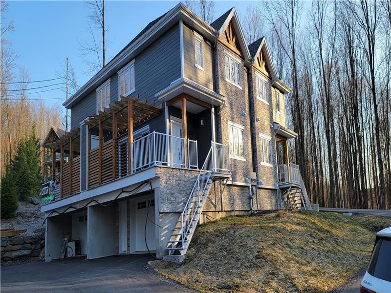 Condo-Chalet ski-in / bike-in/ bike-out dans le domaine Du Cercle des Cantons