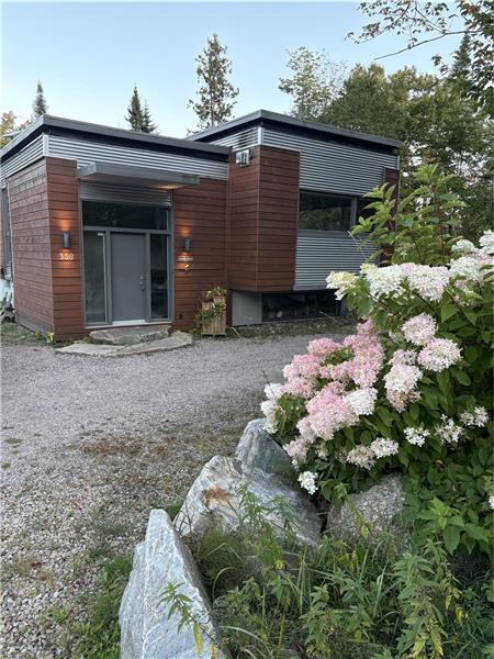 Location de Chalet Caméléon avec spa et glissade en hiver