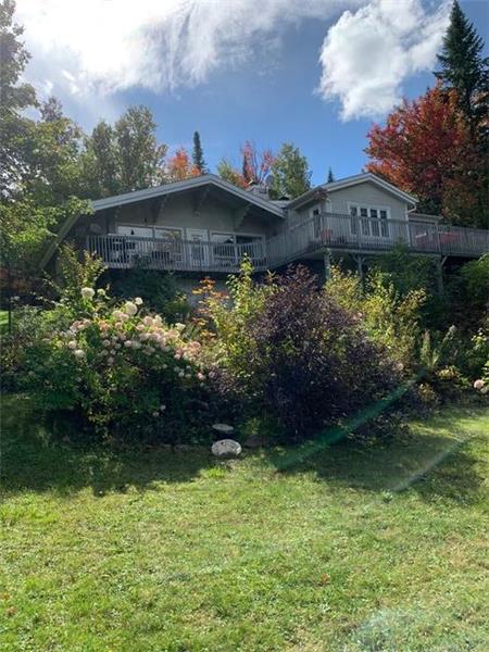 Lovely 5 bedroom house on Lake with dock on Notre Dame. Winter cross country skiing from the door