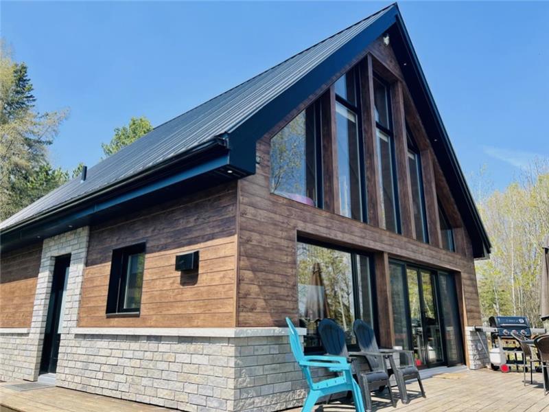 Superb log cabin piece by piece *Spa* *Waterfront* *Gas fireplace*