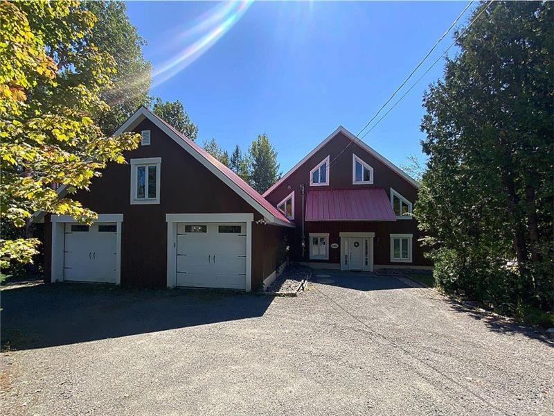 Chalet Beaupin - Spacious Waterfront Retreat with Spa & Game Room