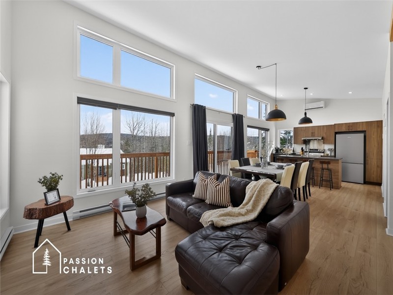 *PASSION CHALETS* | CHALET LE BEC CROISÉ | LAKE ACCESS - KAYAKS - SKI - SPA - BBQ - OUTDOOR FIRE PIT