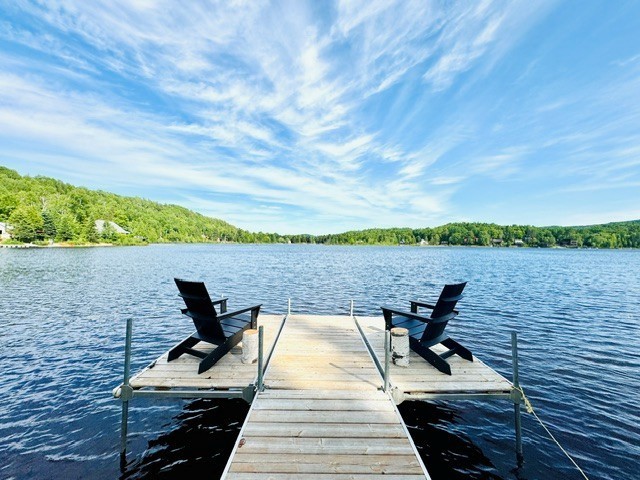 Le Mi-Ange | Lakefront Chalet with Hot Tub, Pedal Boat & Kayaks