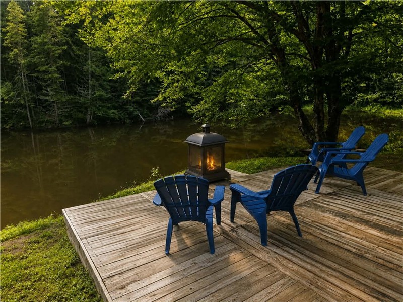 Beautiful chalet with a hot tub and private lake.