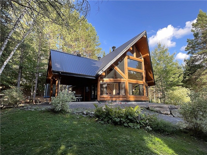 Magnifique chalet en bois rond en location court terme