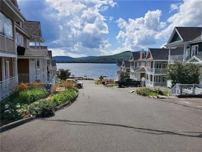 Special for long term/ Condo, Archambault lake, St-Donat, with marina and beach
