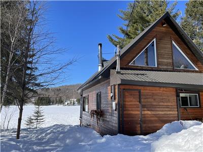 Chalet bord de l'eau, vue  couper le souffle, dtente assure