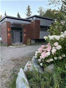 Location de Chalet Caméléon avec spa et glissade en hiver