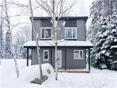 Chalet Ullaakut avec Spa et Poêle à Bois