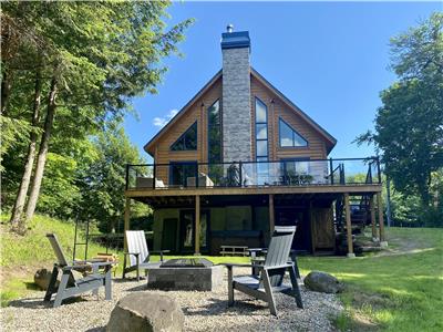 Hummingbird on the Lake - Deluxe 4 bedroom waterfront log home with hot tub and private beach