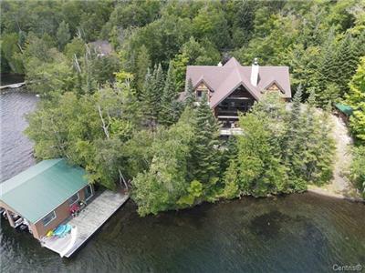 Une raret en Mauricie, trs grand chalet sur un lac extraordinaire