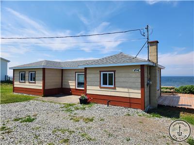 Beige house by the sea