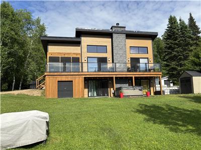 Le Bixan | SPA | Bord de lac navigable | Foyer | Bienvenue aux poilus!