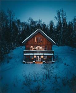 Le Sara | Exit Chalets | SPA & sauna dans la majestueuse fort Ouareau