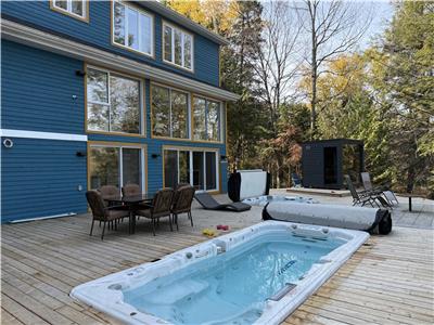 Chalet avec spa de bien être privé au bord d'un lac
